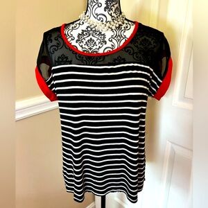 Annabelle, woman’s open- back, short sleeve top, size XL